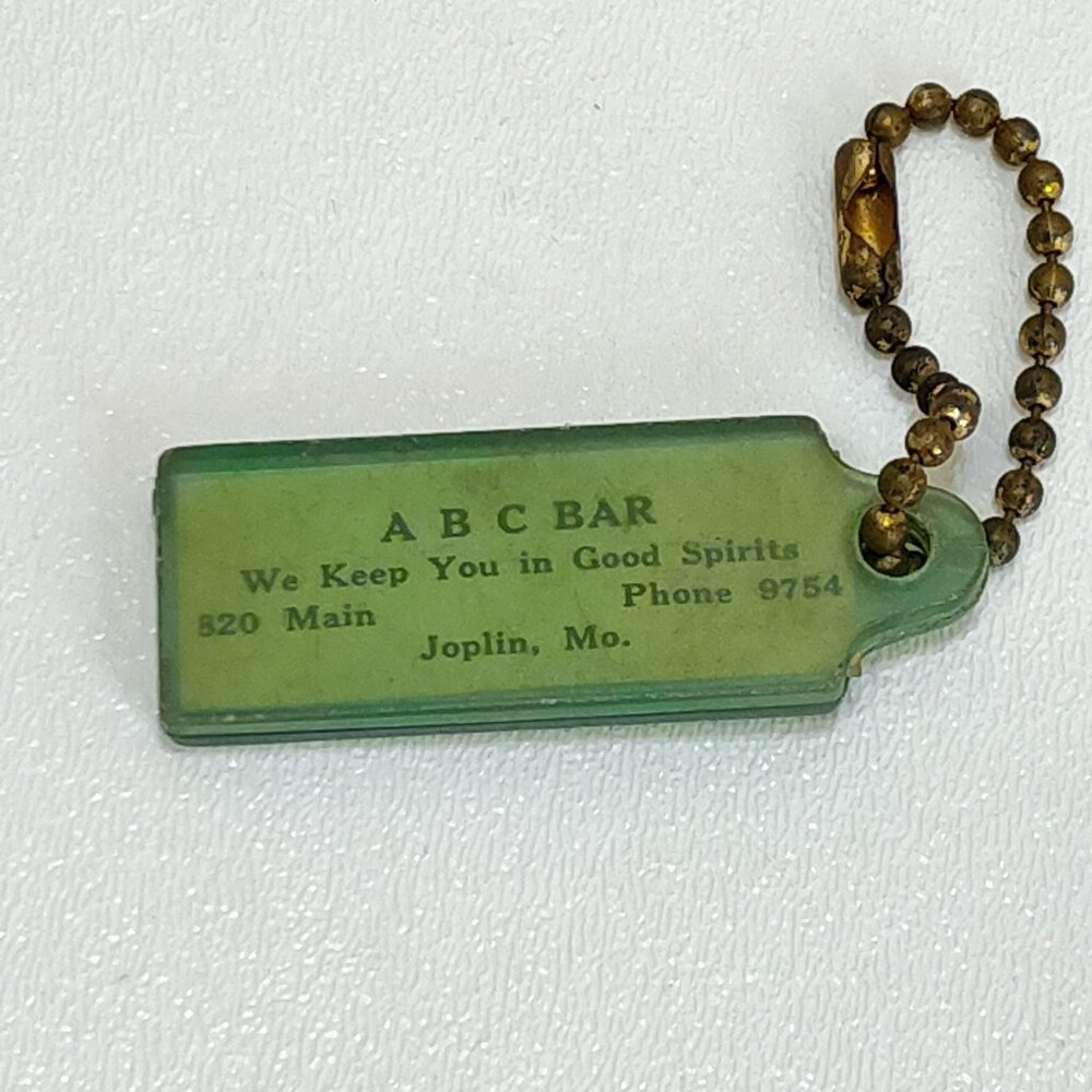 Advertising Keychain ABC Bar Joplin Mo "We Keep You in Good Spirits" Phone: 9754